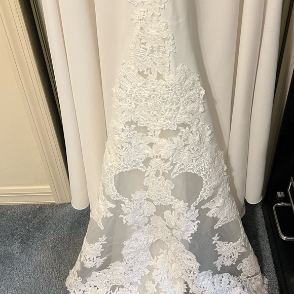New wedding dress. Only tried on. No alterations have been done to this item. - Picture 5 of 9